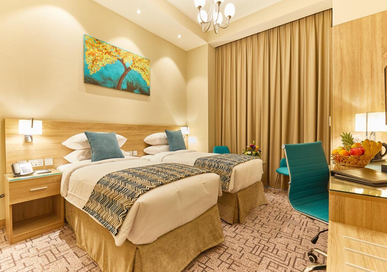 Rose Plaza Hotel Al Barsha Dubái Exterior foto
